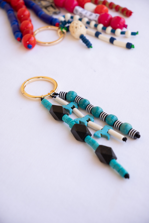 Colorful beaded keychain on a white background