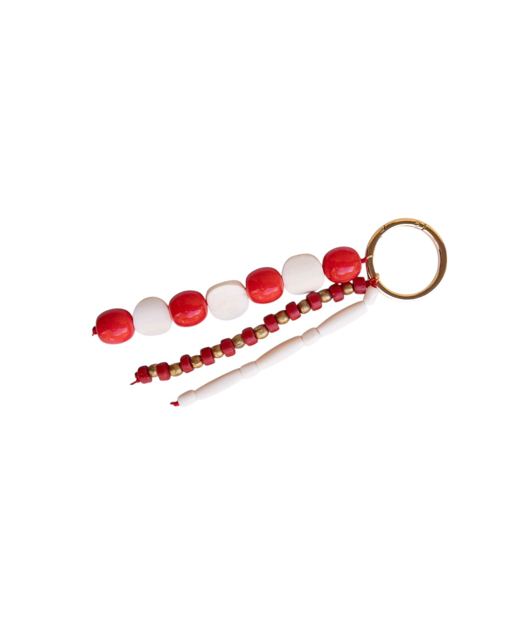 Keychain with red and white beads on a white background