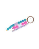 Colorful beaded keychain with a name tag on a white background