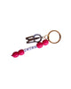 Bag Charm with pink beads and a metal clip on a white background